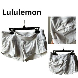 Lululemon sz 6 running shorts | white | back zip pocket with 2 hip pockets |
